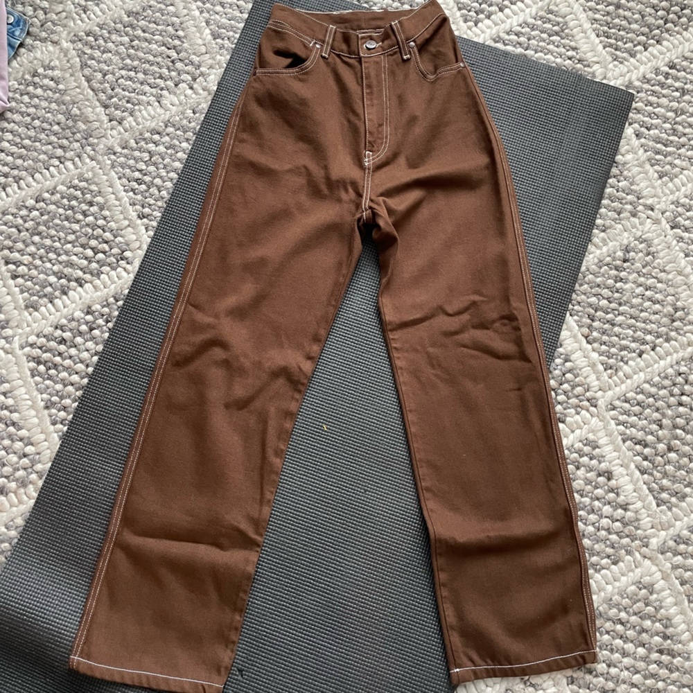 Reformation brown jeans with white stitching